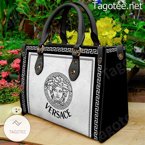 versace sporttasche|Versace black and white purses.